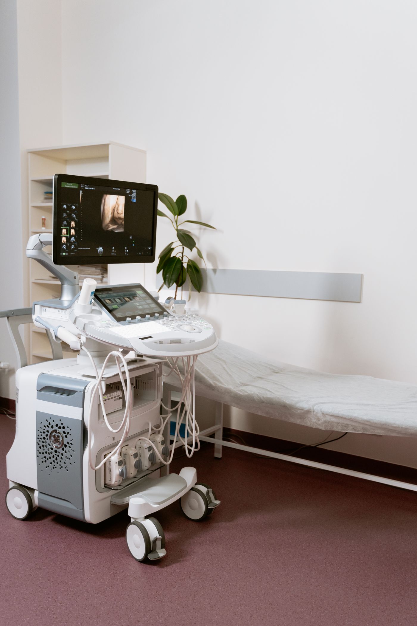 Ultrasound machine and examination couch in a stock clinical setting