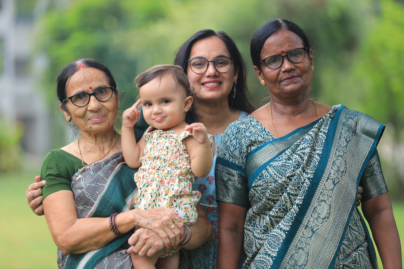 Four generations of an Indian family together outdoors